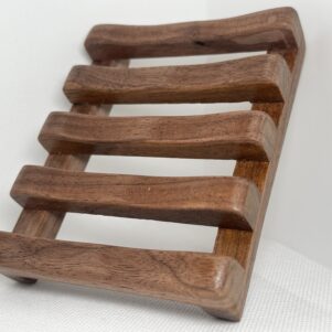 soap dish with a slatted design made from mesquite wood measuring 4.75" x 4". handmade