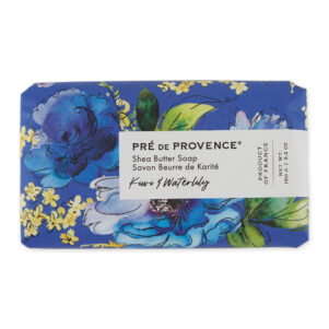 kiwi and waterlily French soap bar wrapped in a floral print paper with light blue dark blue and yellow flowers